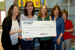 Pictured left to right: Megan Richards, MSO Manager Operations and Marketing, Patricia Brussel, Northern Regional Director for the Emmanuel Cancer Foundation, Pepper Treuvey, MSO Corporate Secretary and Senior Product Development Analyst, and ECF Volunteers, Carole Garmendia & Maureen Lee.