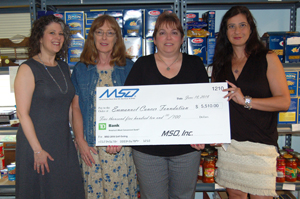 Pictured left to right: Megan Townley, MSO Director Operations & Program Management, Patricia Brussel, Northern Regional Director for the Emmanuel Cancer Foundation, Pepper Treuvey, MSO Corporate Secretary and Senior Product Development Analyst, and ECF Volunteers, Carole Garmendia & Maureen Lee.